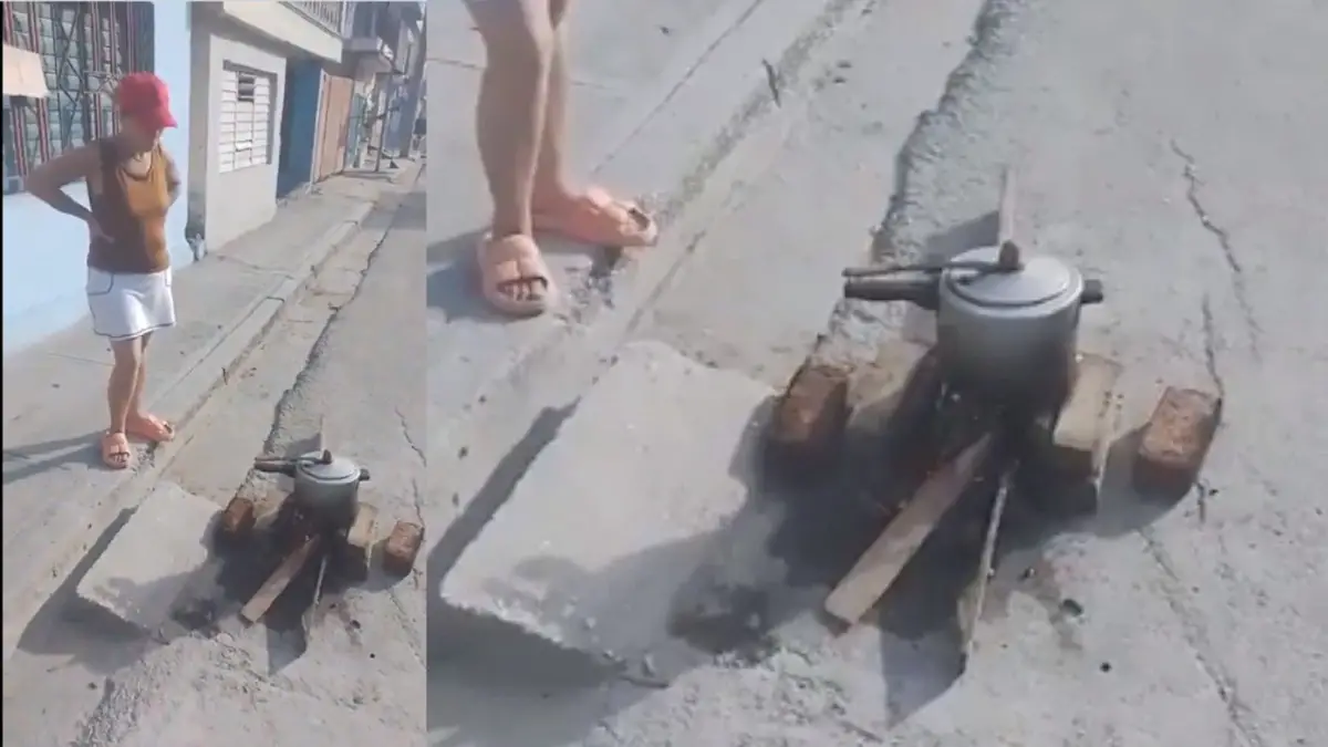 Cubana cocina sus alimentos a leña en plena calle de Holguín por falta de gas (+VIDEO)