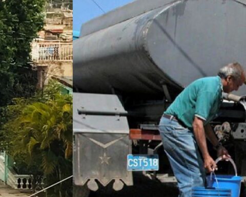 Cubanos corren detrás de una pipa de agua en Santiago de Cuba